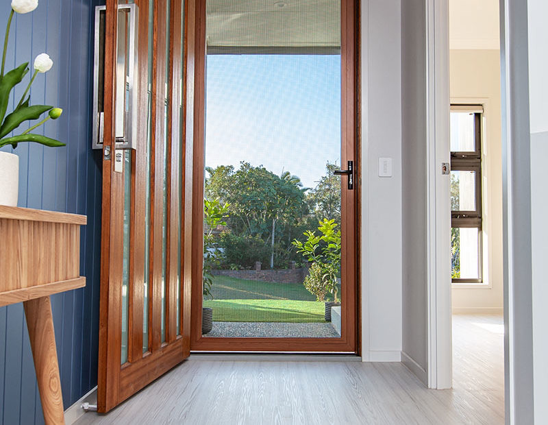 Opened door to outside — Doors & Windows in Armidale, NSW