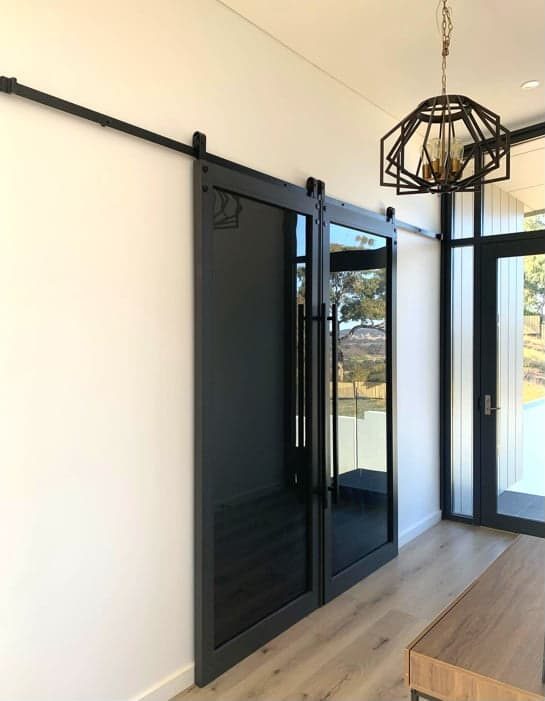 Black glass sliding door — Doors & Windows in Armidale, NSW