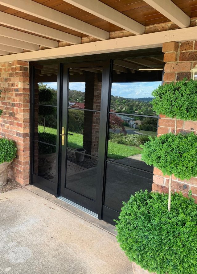 Tinted glass door — Doors & Windows in Armidale, NSW